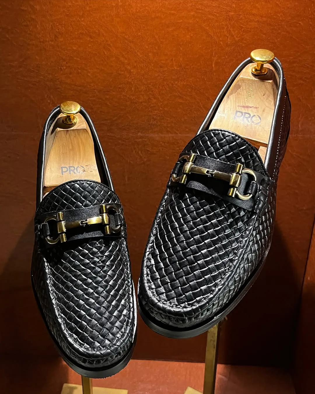 Elegant Black Woven Leather Loafer with Gold Bit Detail