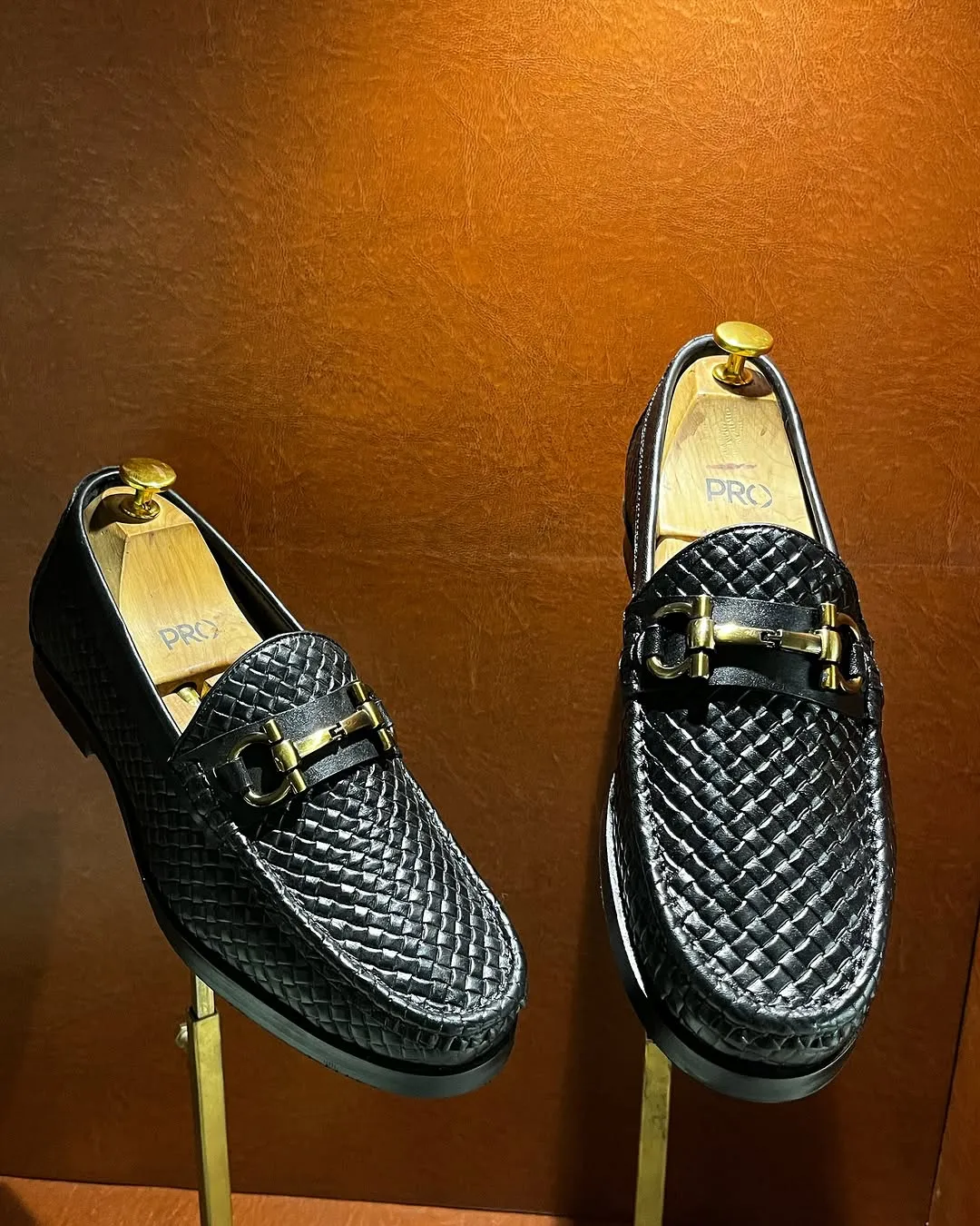 Elegant Black Woven Leather Loafer with Gold Bit Detail
